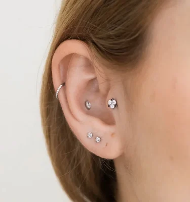 Diseño Lis Circonitas Clicker Engarzadas Mistico